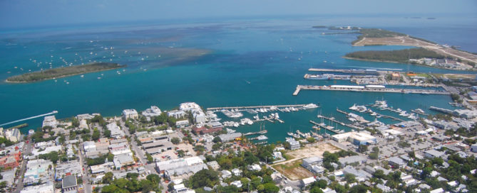 Aerial view over Key West looking north with Duval Street and the Key West Bight Marina.
