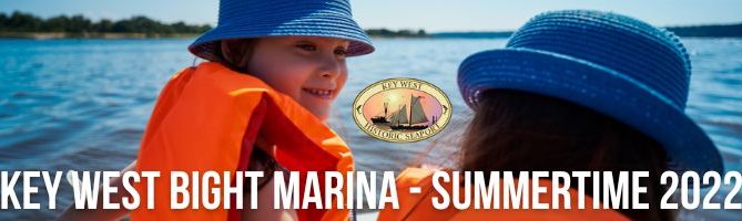 key west bight marina 2022 blog cover photo with two kids in life jackets on the water.